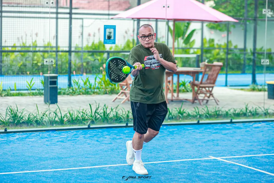 A player hitting a forehand