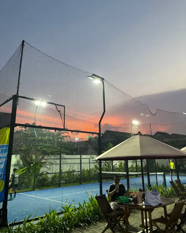 Sunset over a court and the gazebo